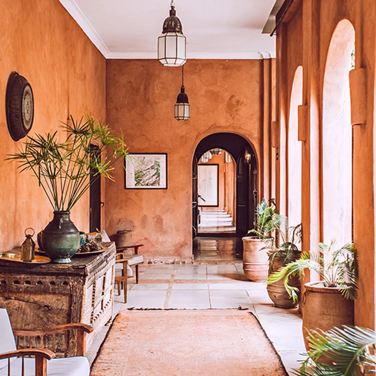 Terracotta arches framing a lounge